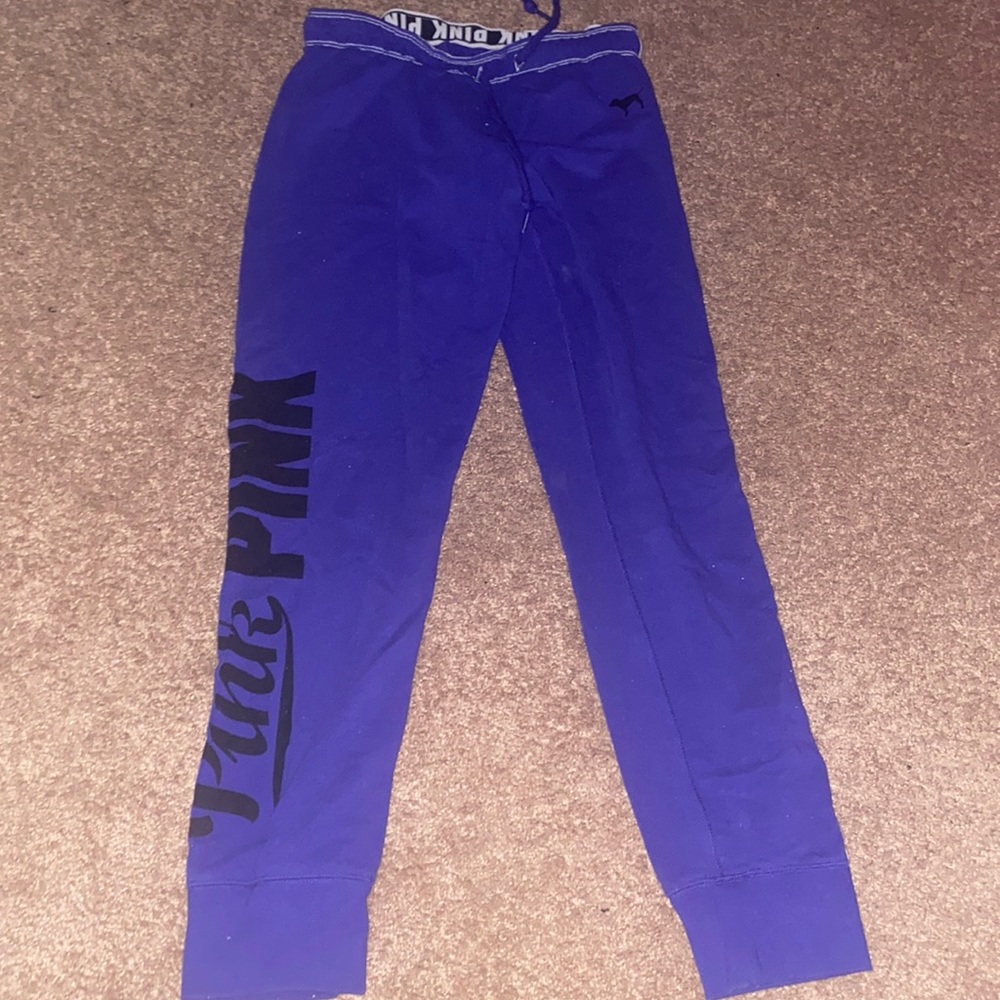 Blue sweatpants.